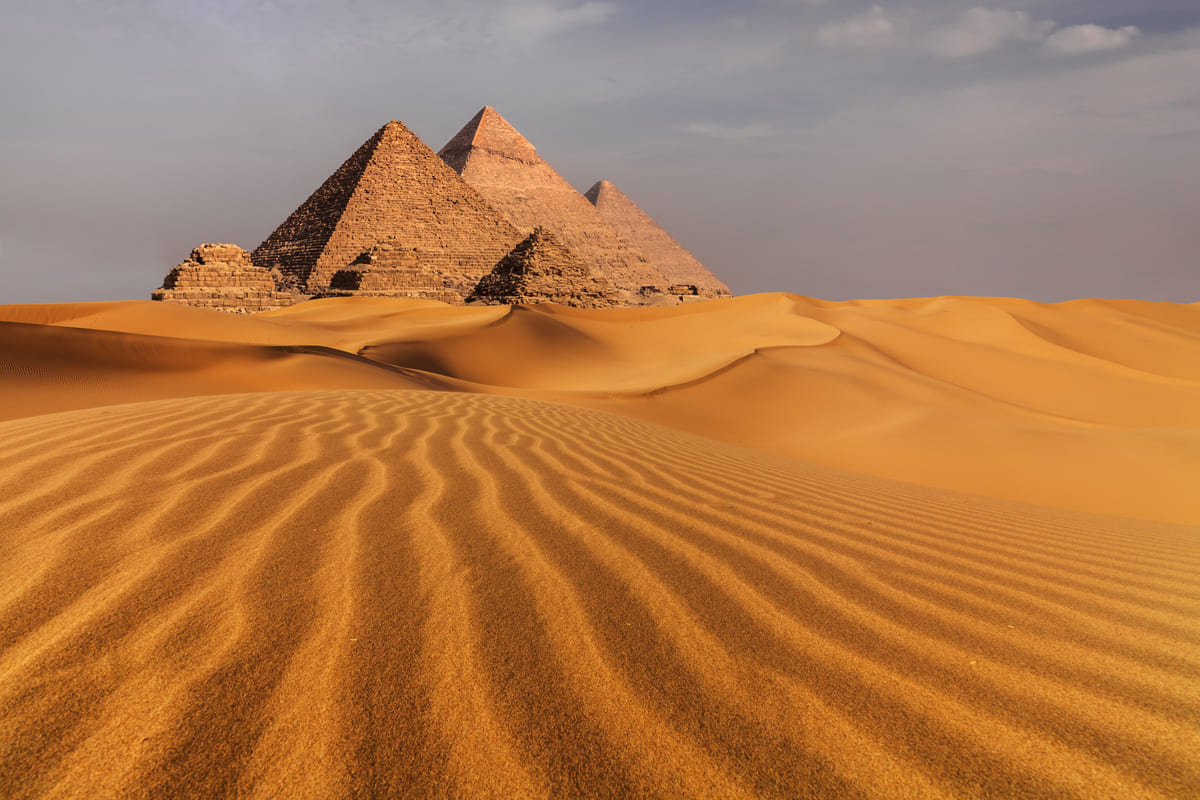 sunset view of pyramid complex of giza in cairo 2022 01 25 08 07 47 utc