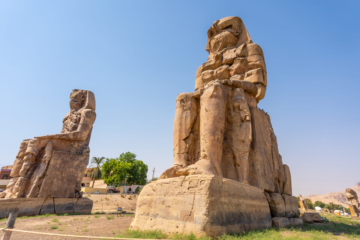 two egyptian sculpture in the city of luxor along 2022 03 09 03 00 24 utc